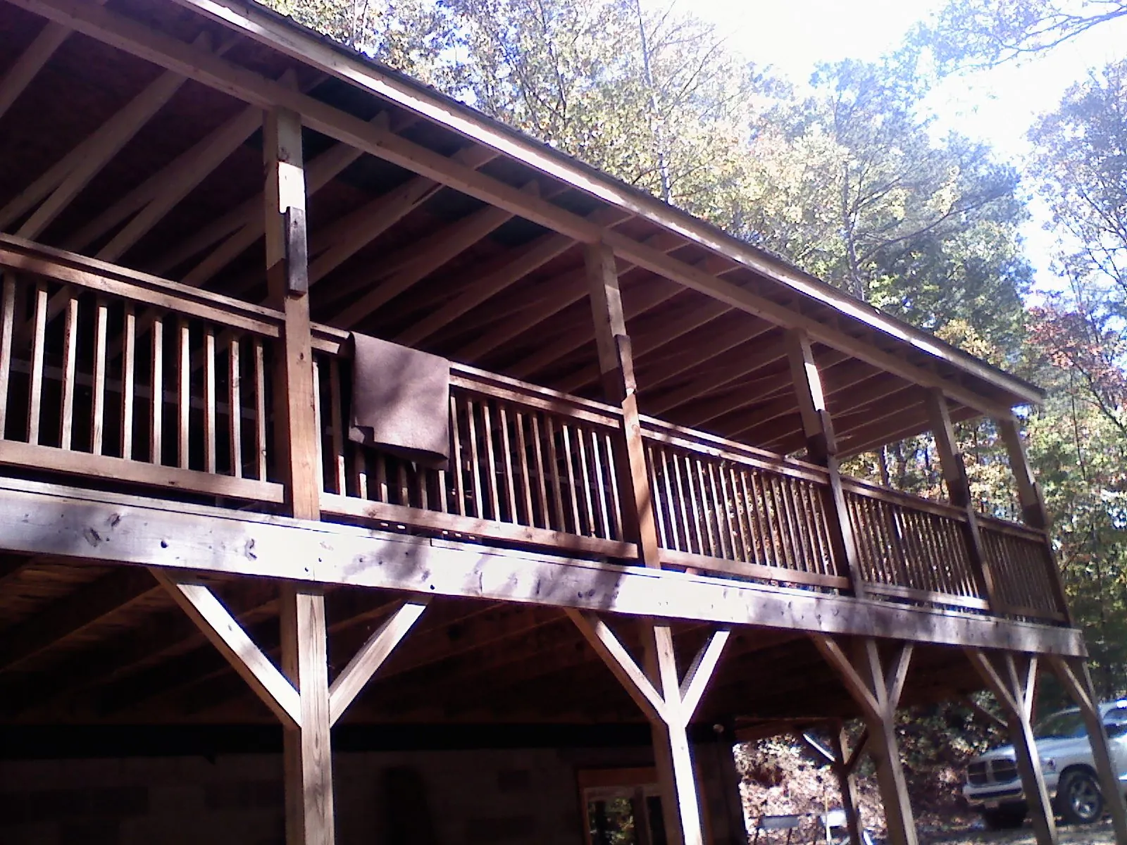 Timber framing under a new elevated porch and deck — Roof Leak Repair in San Diego by Roofing Brothers